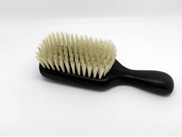 Men's brush, ebony, white bristles.